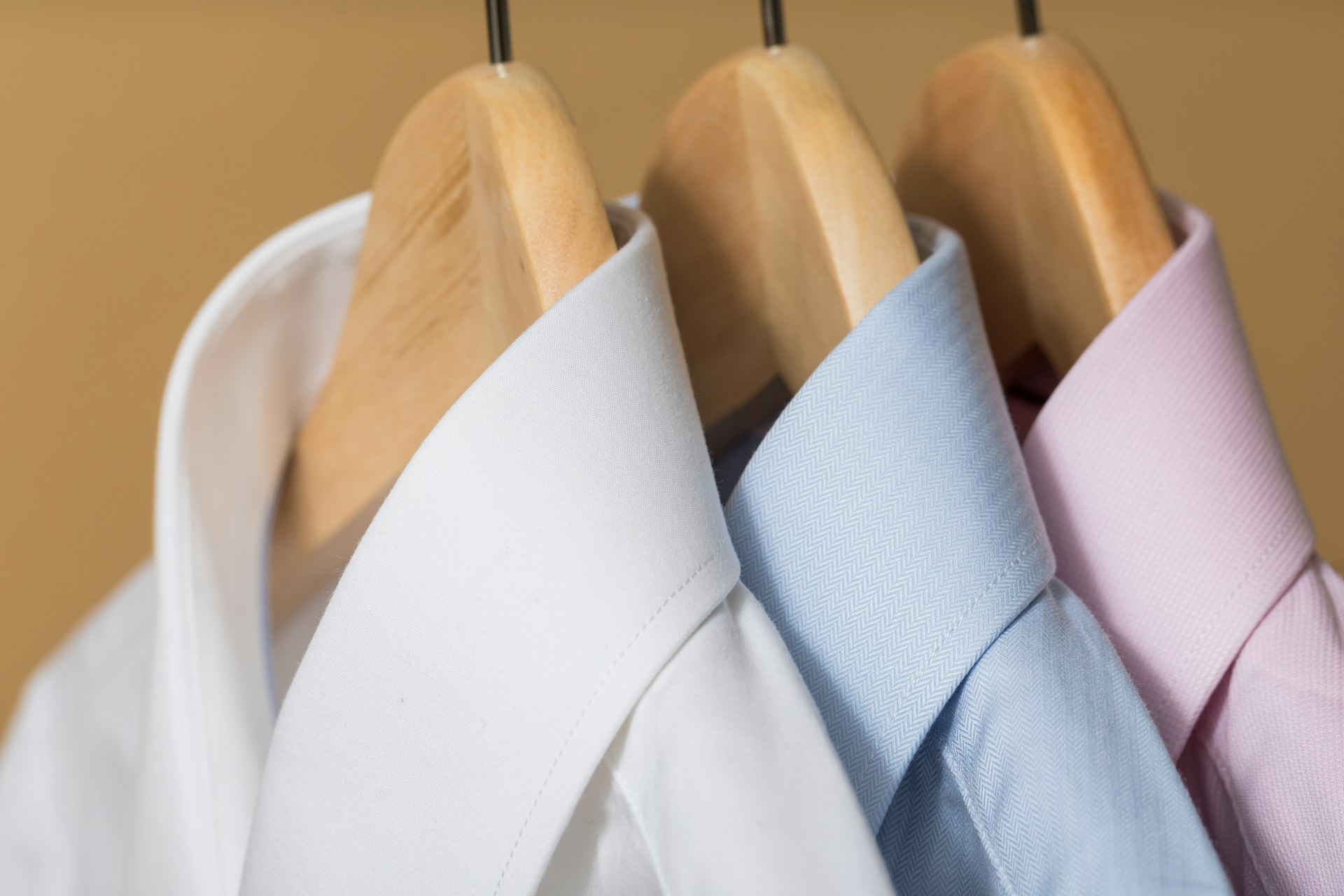 white and purple button up shirt